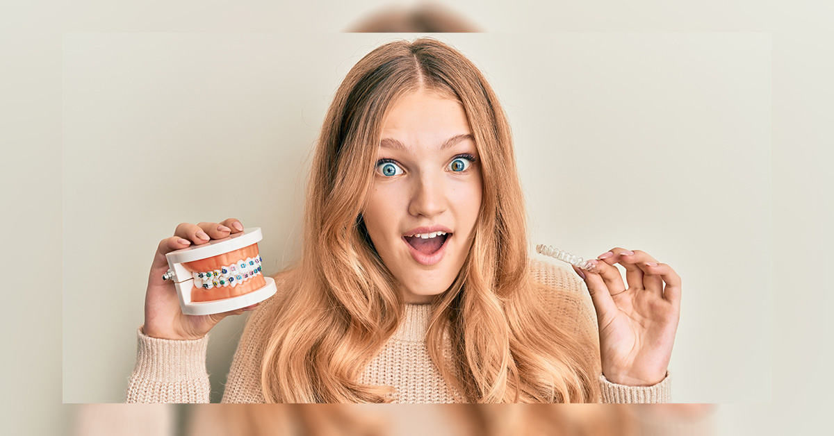 teenage girl chooses invisalign over traditional braces